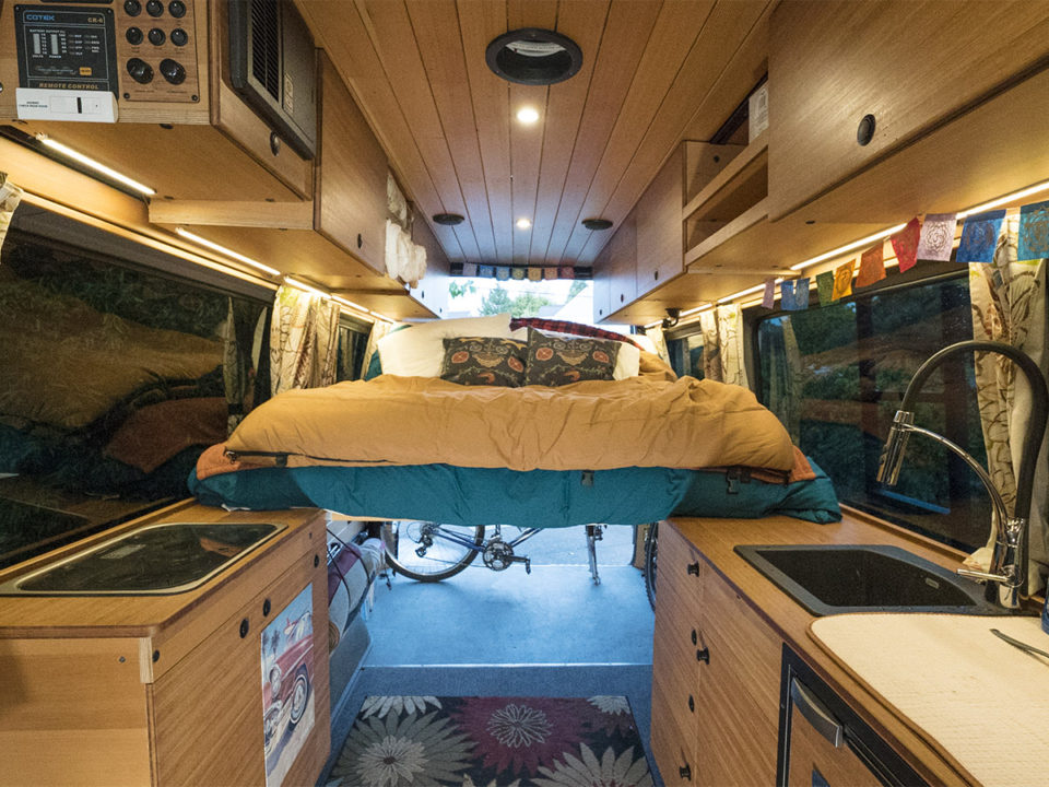 CreatID custom sprinter conversion kitchen cabinets with versatile abundant space for people, bikes, and gear